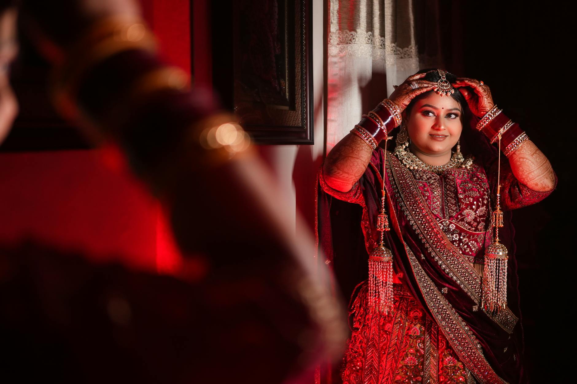 elegant indian bride in traditional red attire