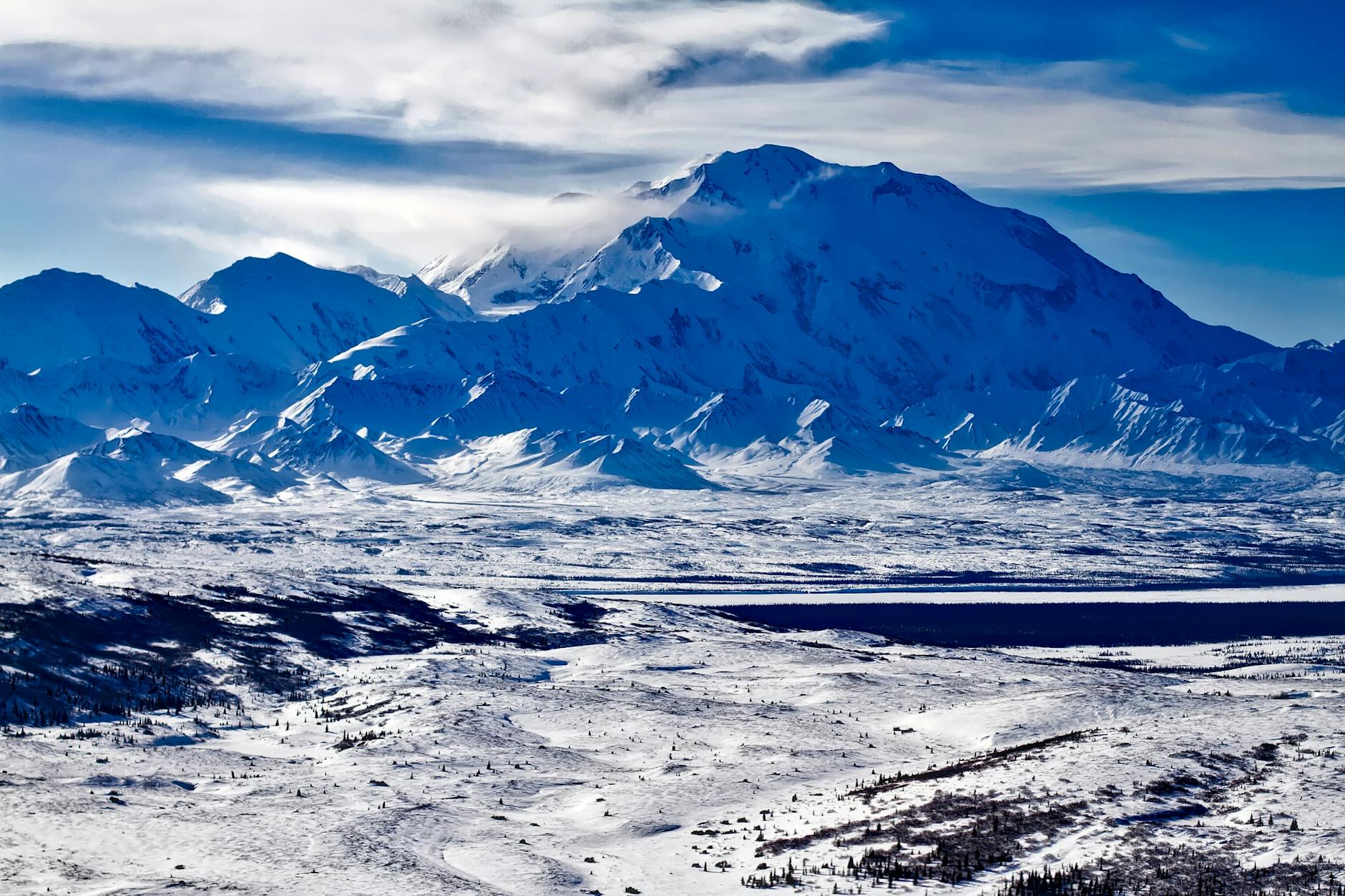 wide angle photo of mountain under blue sk