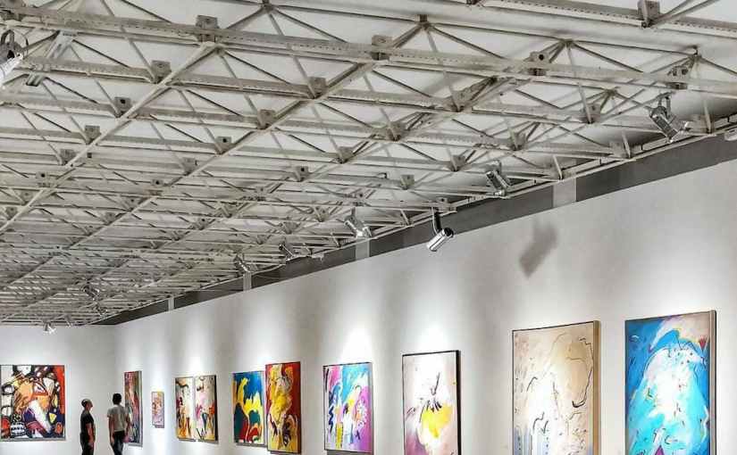 colorful arts hanging on wall