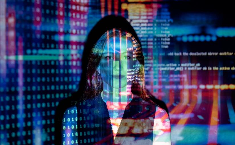 code projected over woman