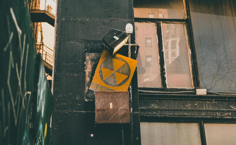 radioactive warning sign on a wall